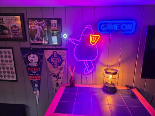 Customer photo review of Purple Mascot First Pitch Neon Sign