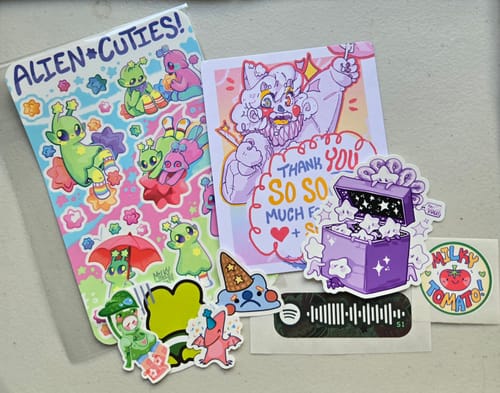 Customer photo review of Cute Alien Sticker Sheet