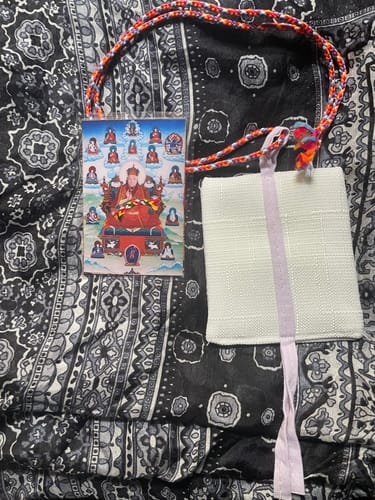 Customer photo review of Amulette Tibétaine Chakra Donyod Khorlo - Protection et purification extrêmes.