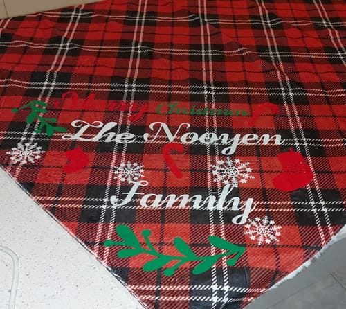 Customer photo review of Christmas Tartan Faux Fur Waterproof Splash Blanket