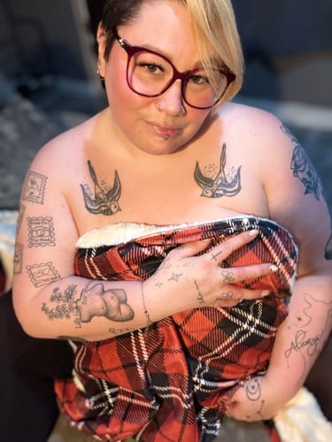 Customer photo review of Christmas Tartan Faux Fur Waterproof Splash Blanket