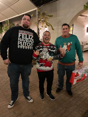 Customer photo review of Feliz Navidad Putos OG Navidad Sweatshirt