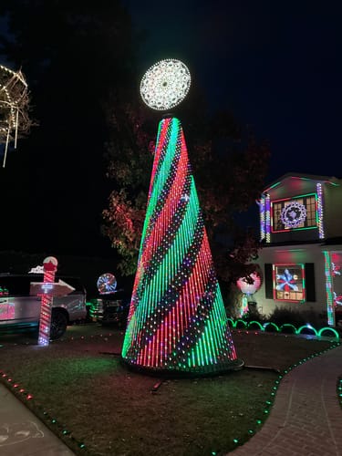 Customer photo review of 🌟 Sasquatch™ MegaTree™ Sliding Topper - Elevate Your Light Show with Ease