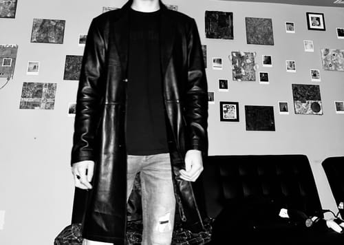 Customer photo review of Black leather 3/4 length trench coat