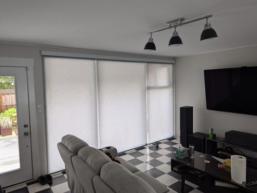 Customer photo review of SmartWings Motorized Light Filtering Roller Shades 70% Blackout Essential