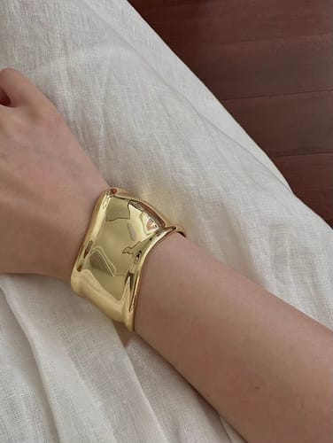 Customer photo review of TinyPresent Small Bone Cuff in 18k Gold
