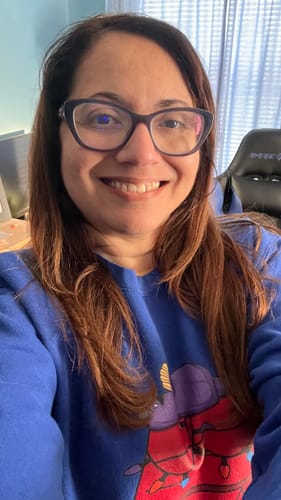 Customer photo review of Purple Mascot Christmas House Sweatshirt