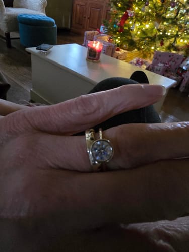 Customer photo review of Angel 1.5 Carat Round Bezel Set Moissanite Diamond Ring in 14k Yellow Gold