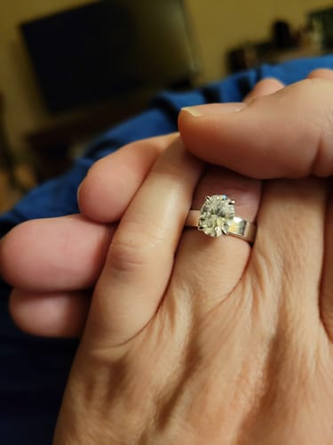 Customer photo review of Solitaire Oval Cut Moissanite Wide Band Engagement Ring