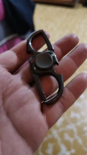 Customer photo review of Finger Spinner Fidget Hand Spinner Anti-Anxiety Toy Relieves Stress Finger Spinner Ketchain Bottle Opener Fidget Toys