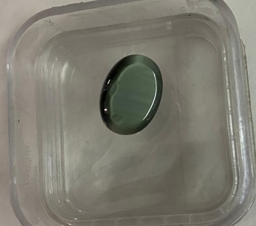 Customer photo review of Certified Cat's Eye Quartz (Lahsunia) 9.13 Cts. (10.04 Ratti) PBVD20