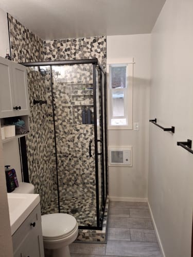 Customer photo review of SUNNY SHOWER Corner Square Shower Enclosure with 1/4 in. Clear Tempered Glass Double Sliding Shower Doors, Black Finish