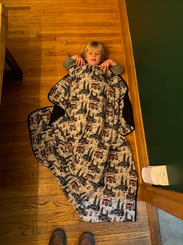 Customer photo review of Mountains to Climb Quilted Blanket