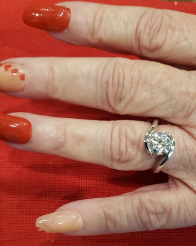 Customer photo review of Solitaire Tension Set Moissanite Bypass Engagement Ring