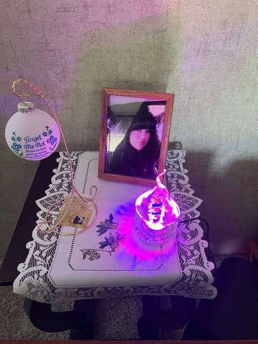 Customer photo review of Illuminated Tri-Color Glass Flame Paperweight with Ashes