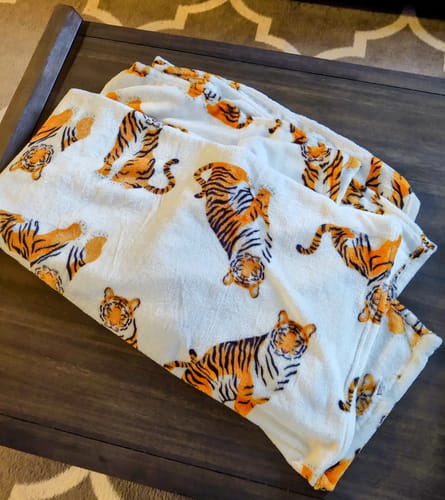 Customer photo review of Cuddly Tiger Throw Blanket