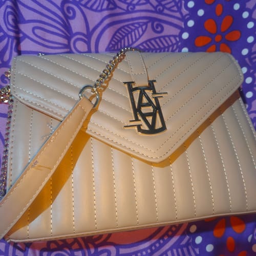 Customer photo review of MADRID LEATHER ENVELOPE BAG