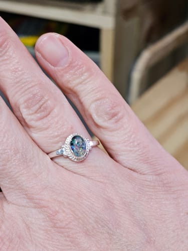 Customer photo review of Braided Oval Opal Cremation Ring