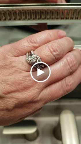 Customer video review of Swirl Three Stone Moissanite Twisted Pave Engagement Ring