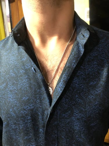 Reseña con foto de un cliente sobre Collar Traveler Plata S925 Premium