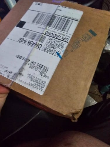 Customer photo review of CaJohns Black Garlic Chipotle Hot Sauce