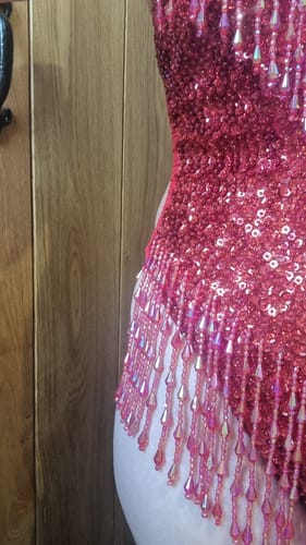 Customer photo review of Shimmy Shimmy Sequin Bodysuit in Ruby