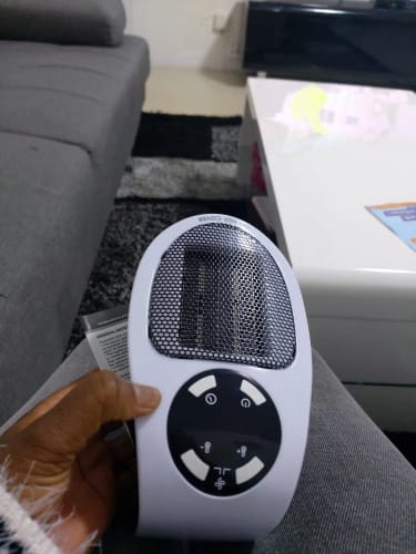 Customer photo review of Calentador Portátil con termostato electrónico y control