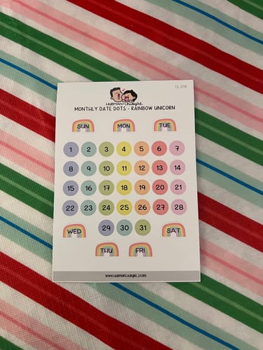 Customer photo review of Monthly Date Dots - Rainbow Unicorn Planner Stickers
