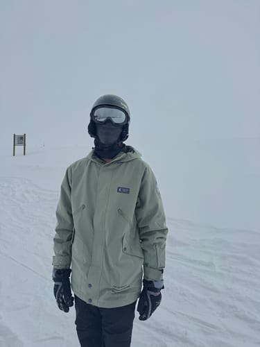 Customer photo review of HOTIAN Men's and Women's New Raised Windproof Neckline Ski Jacket