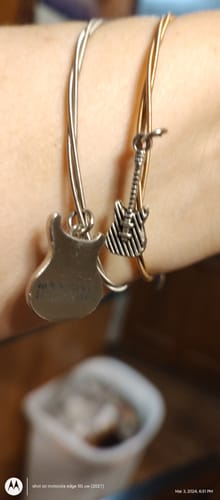 Customer photo review of OFFICIAL ROCK & ROLL HALL OF FAME GUITAR STRING BRACELET