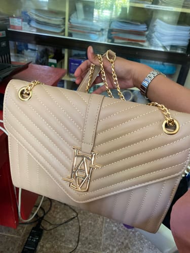 Customer photo review of MADRID LEATHER ENVELOPE BAG