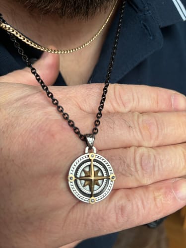 Customer photo review of Black & Gold North Star Pendant