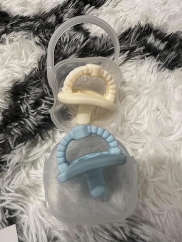 Customer photo review of Newborn Teether Pacifiers 2 in 1 (6 Months onwards)