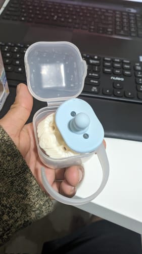 Customer photo review of Newborn Teether Pacifiers 2 in 1 (0-6 Months)