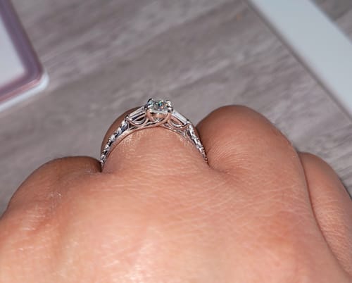 Customer photo review of Three Stone Oval Moissanite And Tapered Baguette Pave Engagement Ring