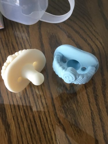 Customer photo review of Newborn Teether Pacifiers 2 in 1 (0-6 Months)