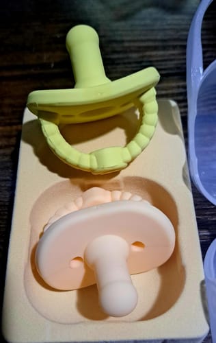 Customer photo review of Newborn Teether Pacifiers 2 in 1 (6 Months onwards)