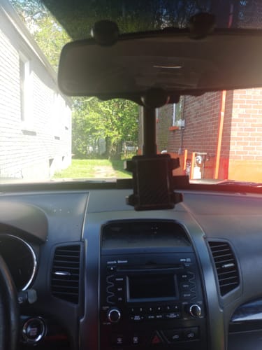 Customer photo review of 🤳🏽Multifunctional 360 Rotatable Car Rearview Mirror Phone Holder