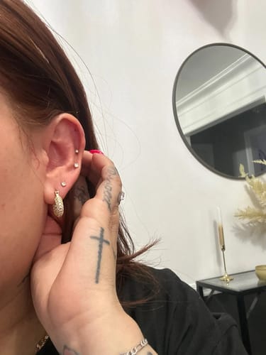 Customer photo review of Mini Pavé Huggie Hoop Gold Earrings