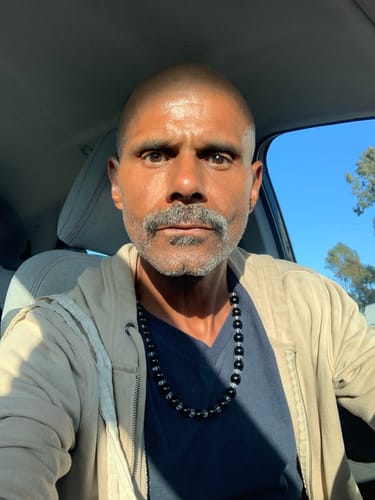 Customer photo review of Break Curses: Black Tourmaline Amplified Necklace