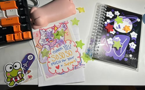 Customer photo review of Planet Person With Star Babies Small Reusable Sticker Book