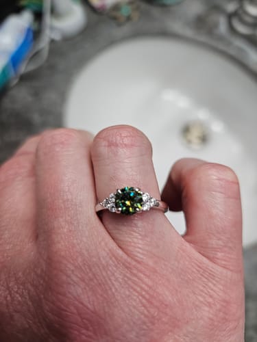 Customer photo review of Green Moissanite Side Stone Engagement Ring