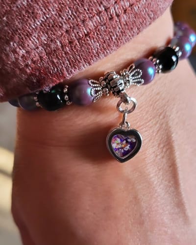 Customer photo review of Black Flower and Glass Healing Bracelet with Cremation Ashes
