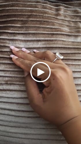 Customer video review of Luxurious 11.5 Carat Emerald Cut Engagement Ring In Sterling Silver