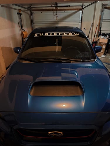 Customer photo review of SubieFlow Windshield Banners