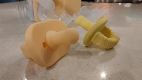 Customer photo review of Newborn Teether Pacifiers 2 in 1 (6 Months onwards)