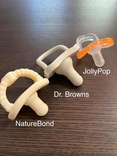 Customer photo review of Newborn Teether Pacifiers 2 in 1 (6 Months onwards)
