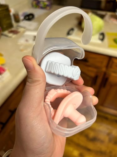 Customer photo review of Newborn Teether Pacifiers 2 in 1 (6 Months onwards)