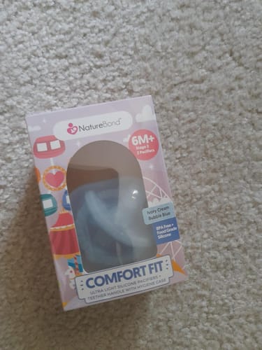 Customer photo review of Newborn Teether Pacifiers 2 in 1 (6 Months onwards)