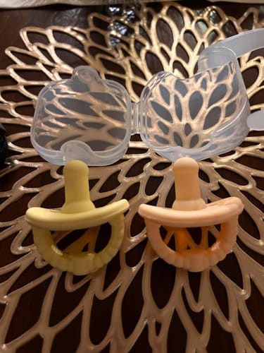 Customer photo review of Newborn Teether Pacifiers 2 in 1 (6 Months onwards)